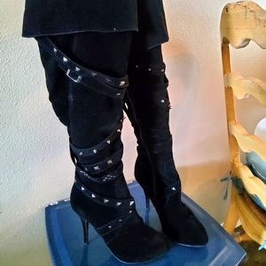 Thigh high heeled boots